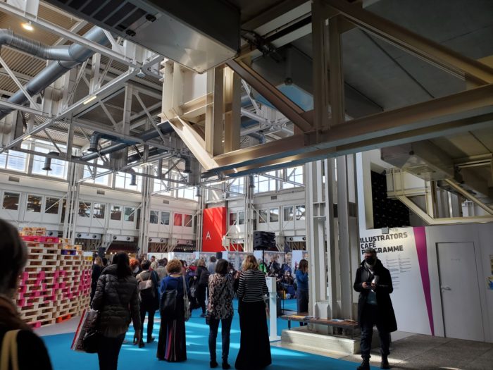 Photo showing attendees in one of the halls at the Bologna Book Fair